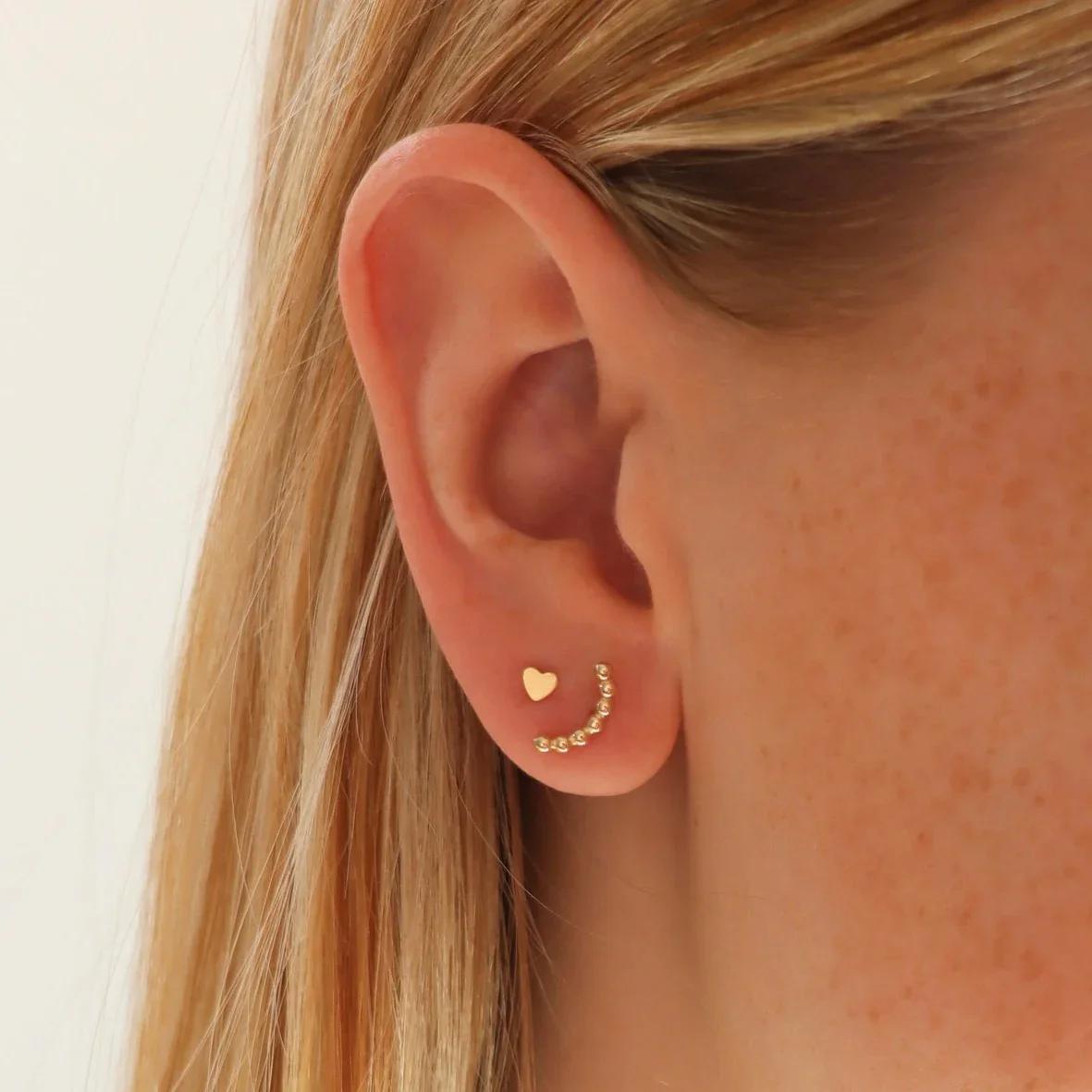 3 Tiny Heart Studs.webp