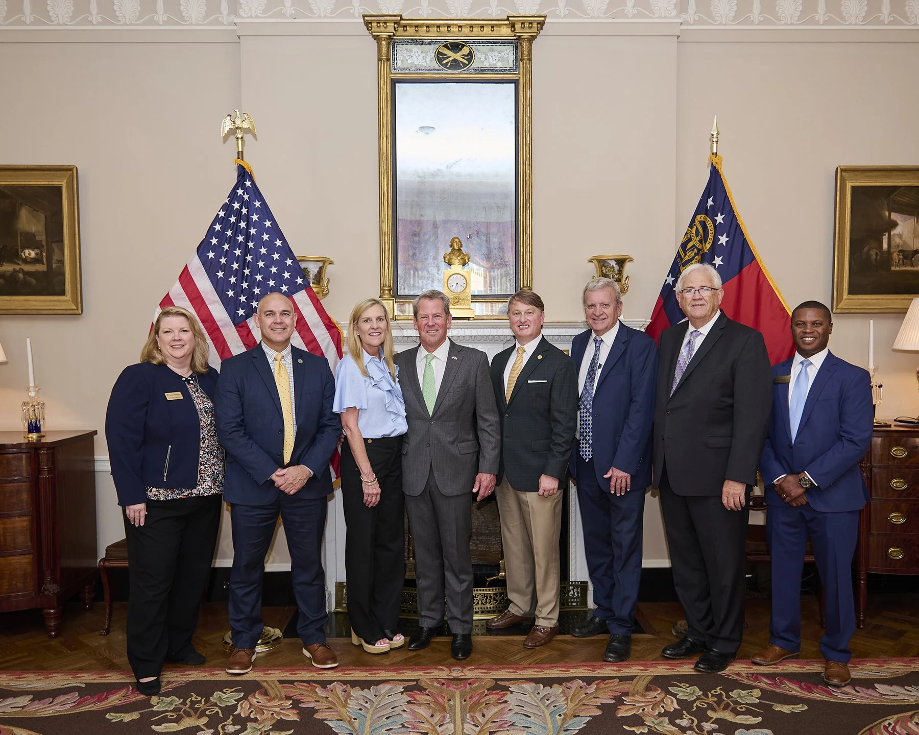 Georgia Government and Civic Leadership Event Photography
Governor Brian Kemp and his wife, Marty Kemp host government officials and civic leaders as they pose for a formal group portrait during an official event at the Governor's Mansion.