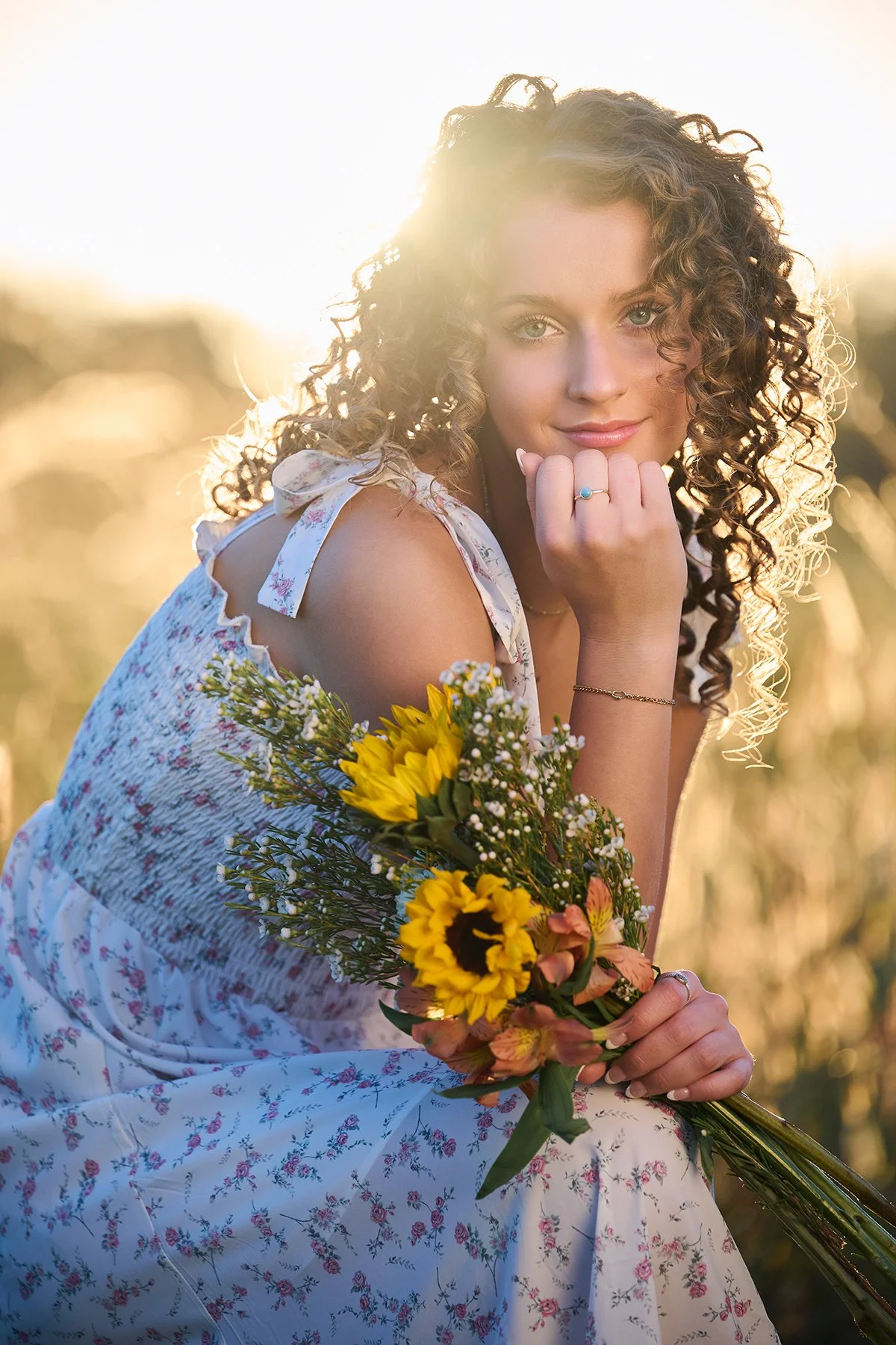 Girls senior portrait at golden hour with a Class of 2027 senior holding flowers, photographed by South Atlanta Photography for senior sessions in Peachtree City and Fayette County.