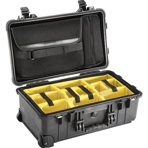 Open black Pelican 1510 rolling camera case with yellow padded dividers for protecting and transporting professional photography equipment.