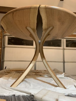 round-resin-cafe-table-with-laminated-curved-legs.jpeg