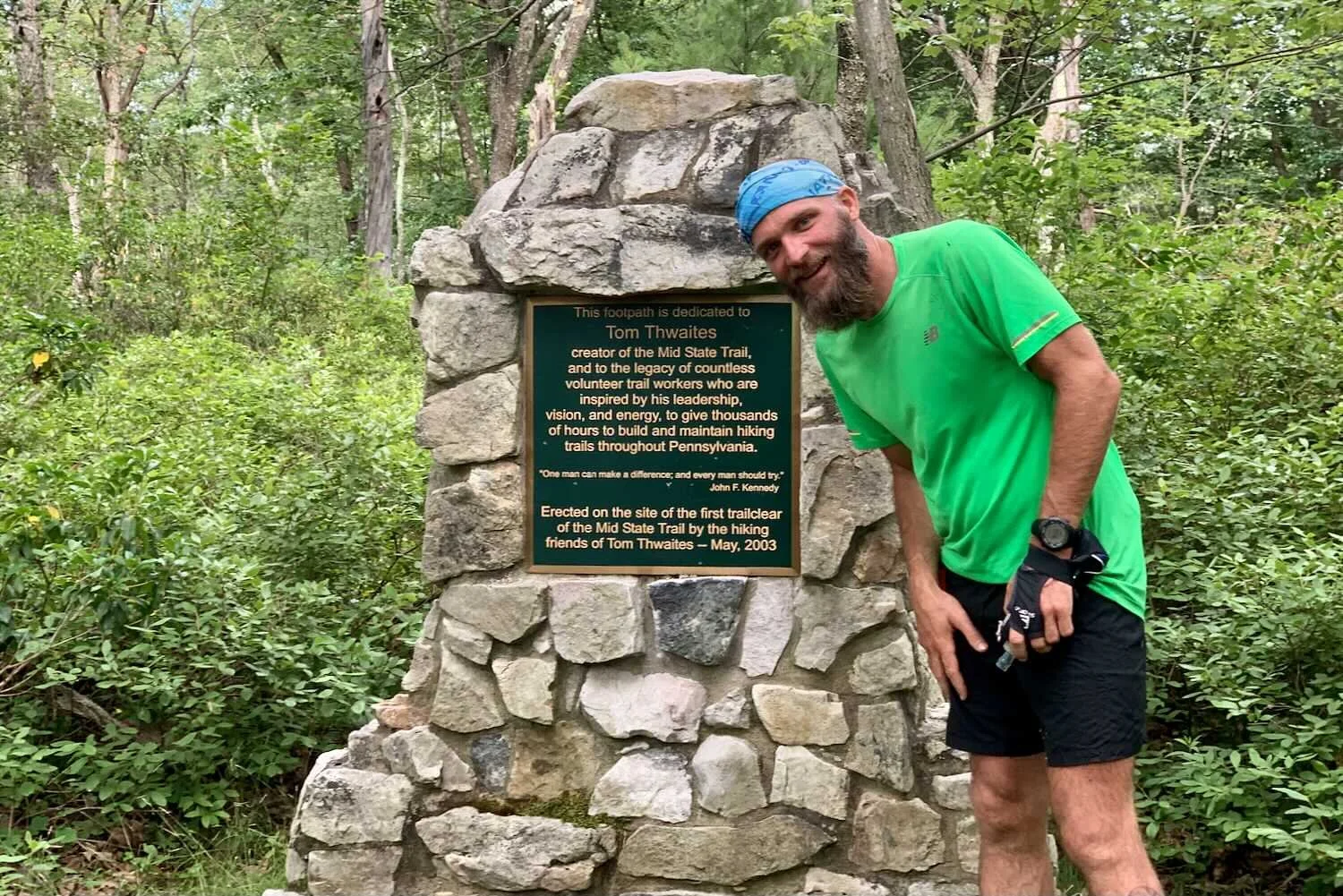 Eric at the Tom Thwaites memorial on top of Little Flat (birthplace of the Mid State Trail)