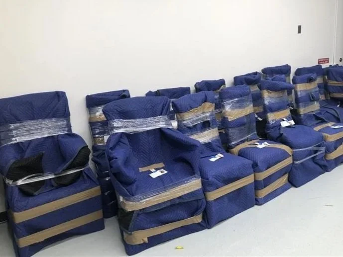 Antique chairs wrapped by Artserve technicians for transportation