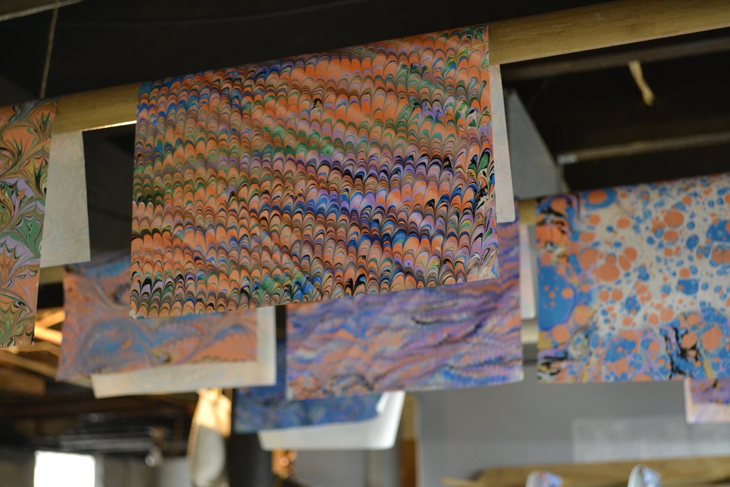 In the early days, I had some dowels set up for drying the papers 