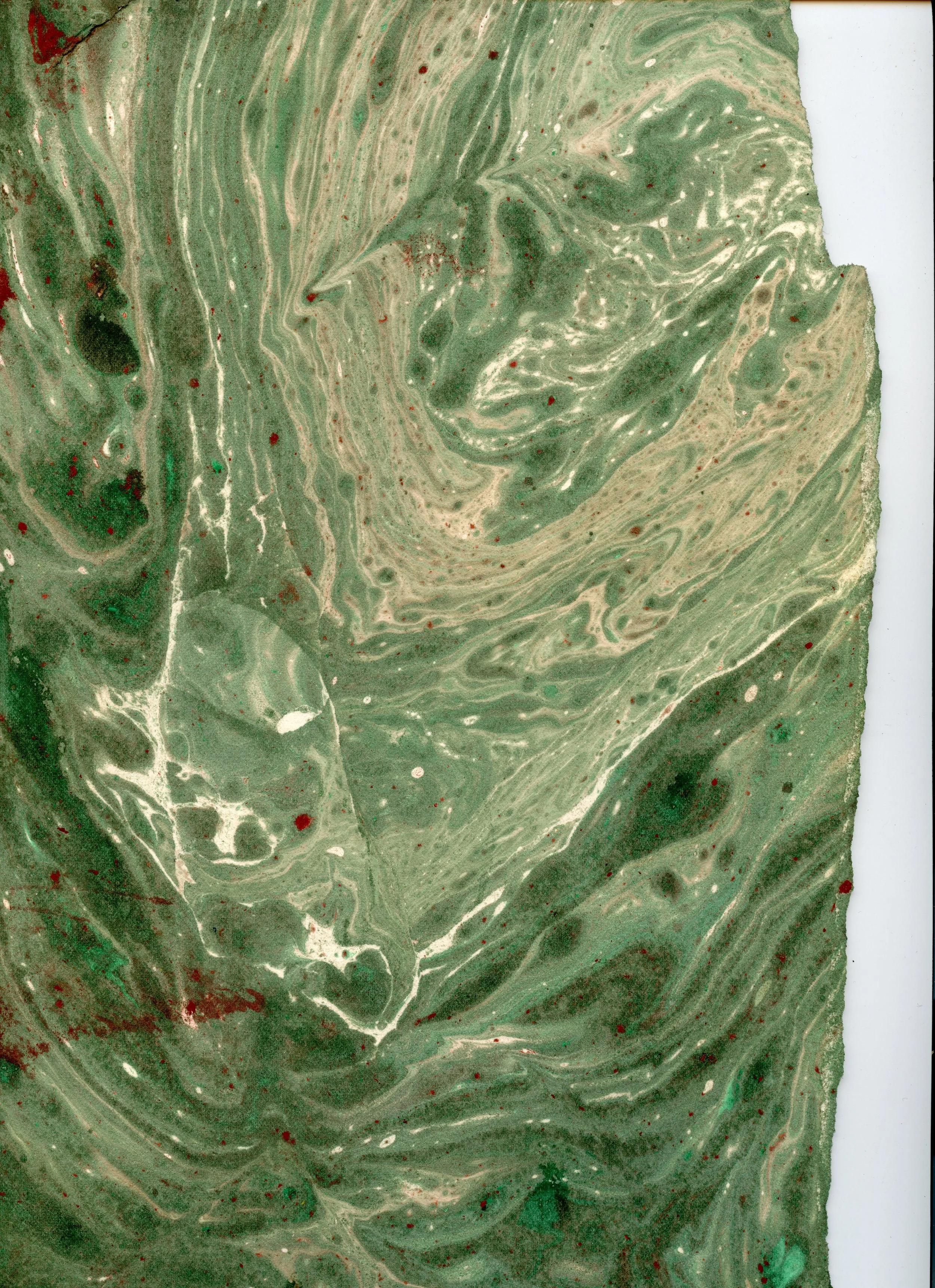 Examples of oil paint marblings I made for book covers 