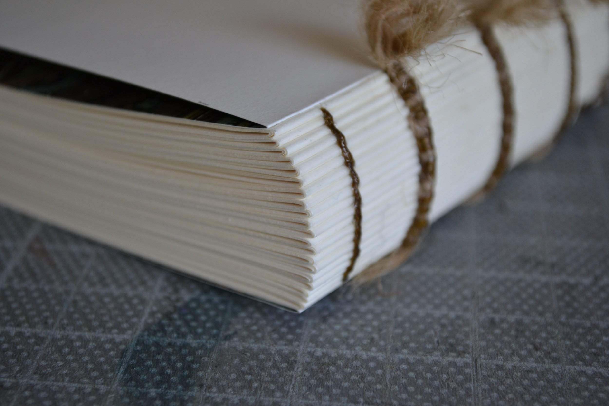 A spine glued and hammered round