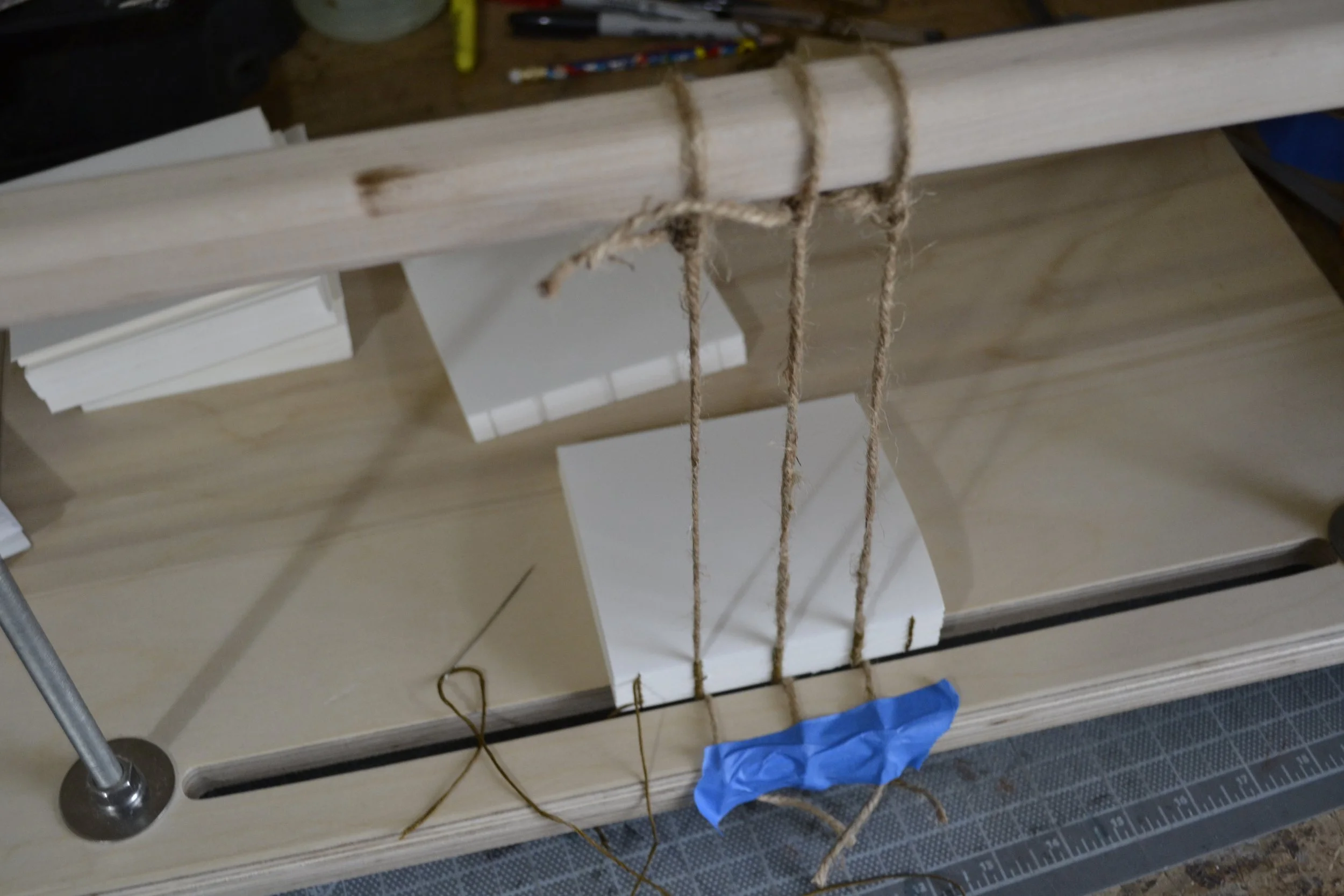 Sewing on my sewing frame (above)