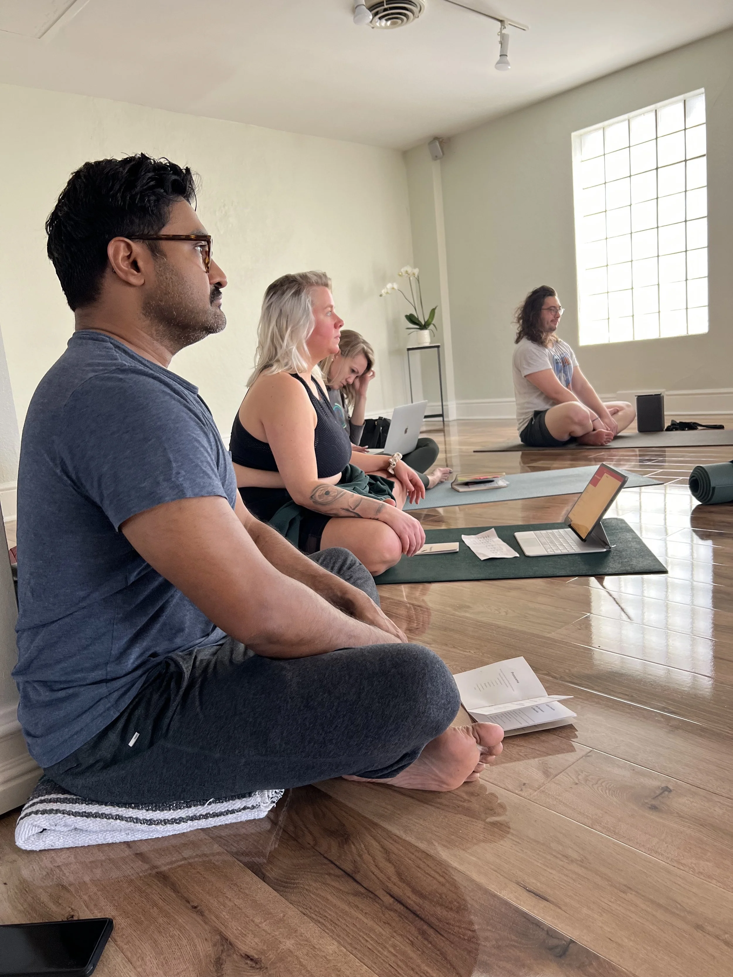 student in yoga teacher training