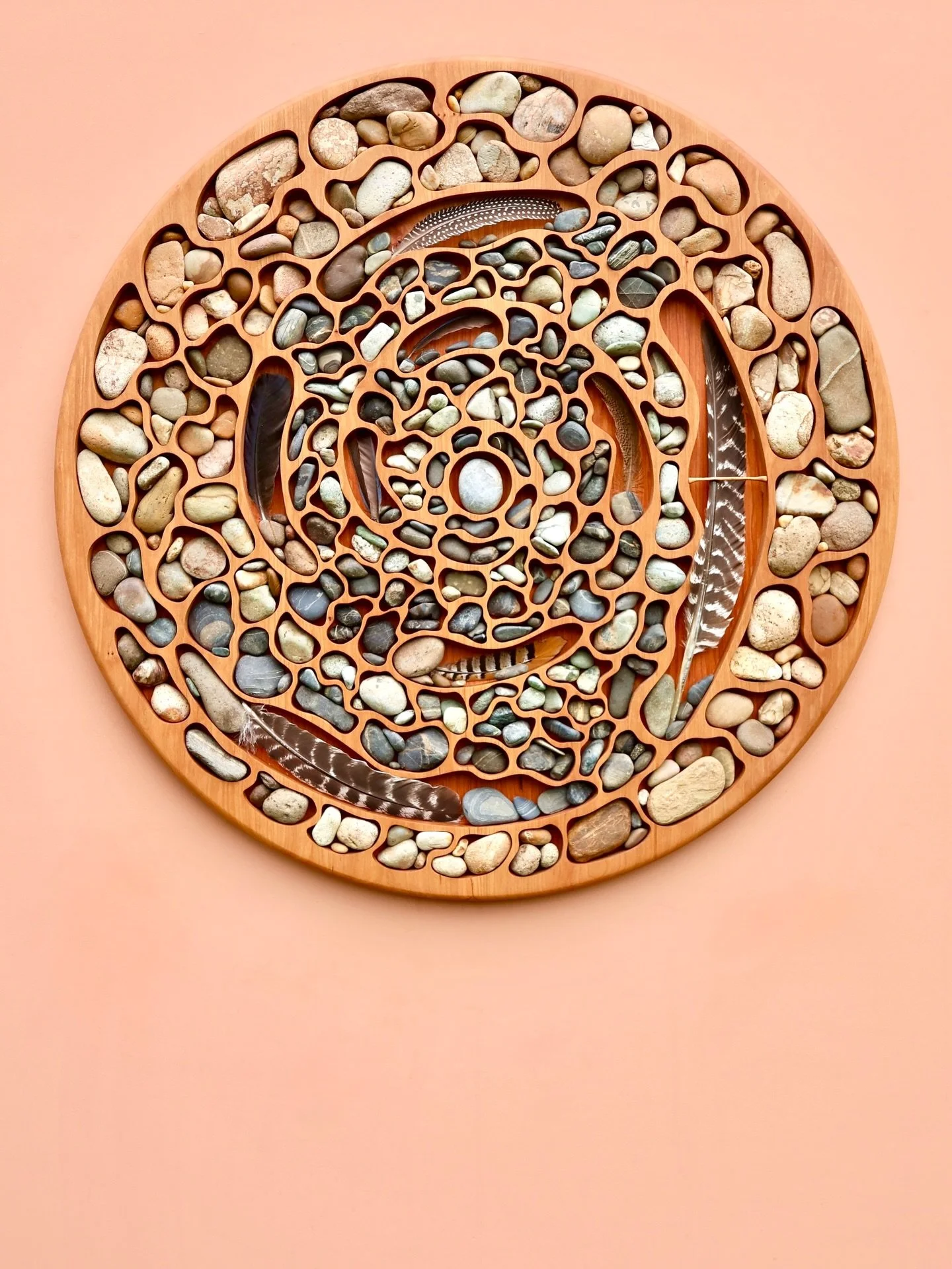 Laura got a hold of me about a piece she wanted made. She spoke about a feather she hoped to display and imagined the design as a circle.

Feathers don&rsquo;t just fall. They spin gently through the air. Like a maple seed drifting to the ground.

Be