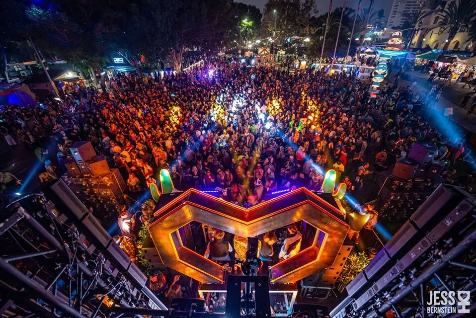 An elevated view from behind the stage of the 3500 attendees during the peak of the event.