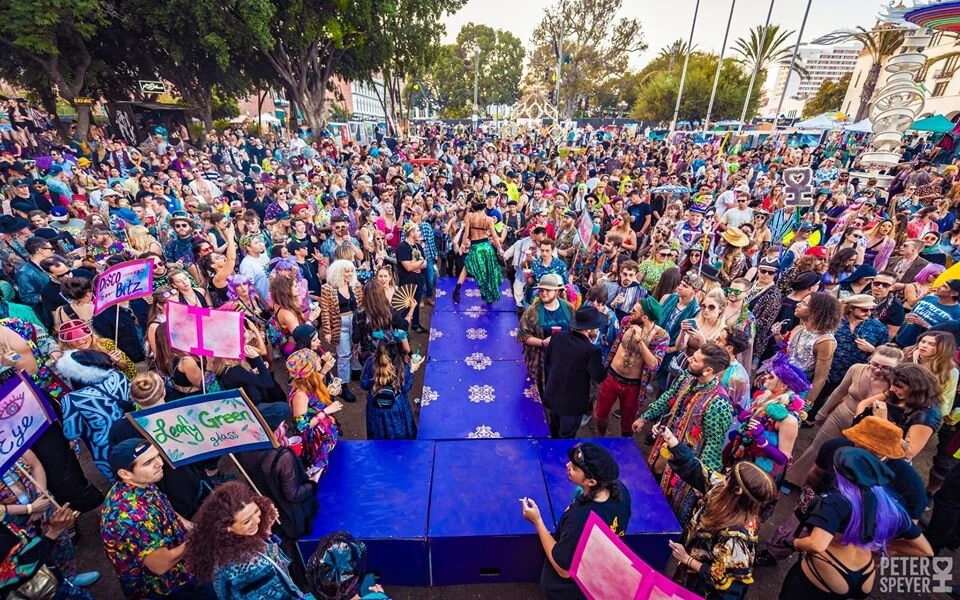 A capture of the iconic fashion show that took place in the middle of the dance floor in front of the stage.