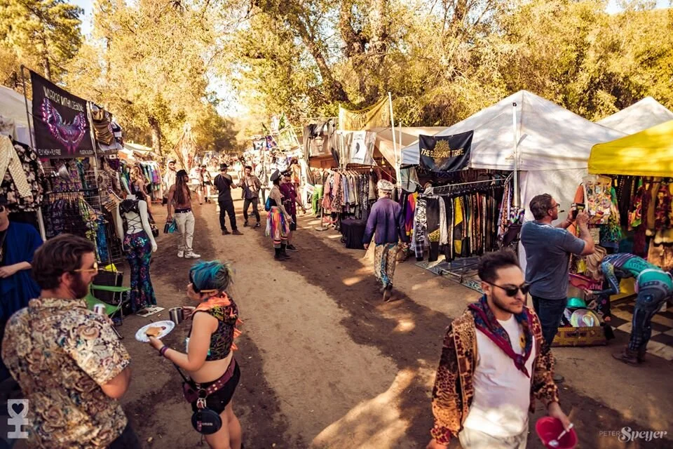 View from vendor row where participants can interactive with carefully curated custom clothing brands from around the world.
