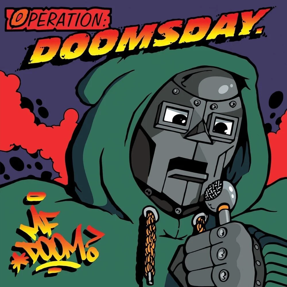 Illustration of a masked figure in a green hooded sweatshirt holding a microphone with stylized text "Operation: Doomsday" and "MF DOOM".
