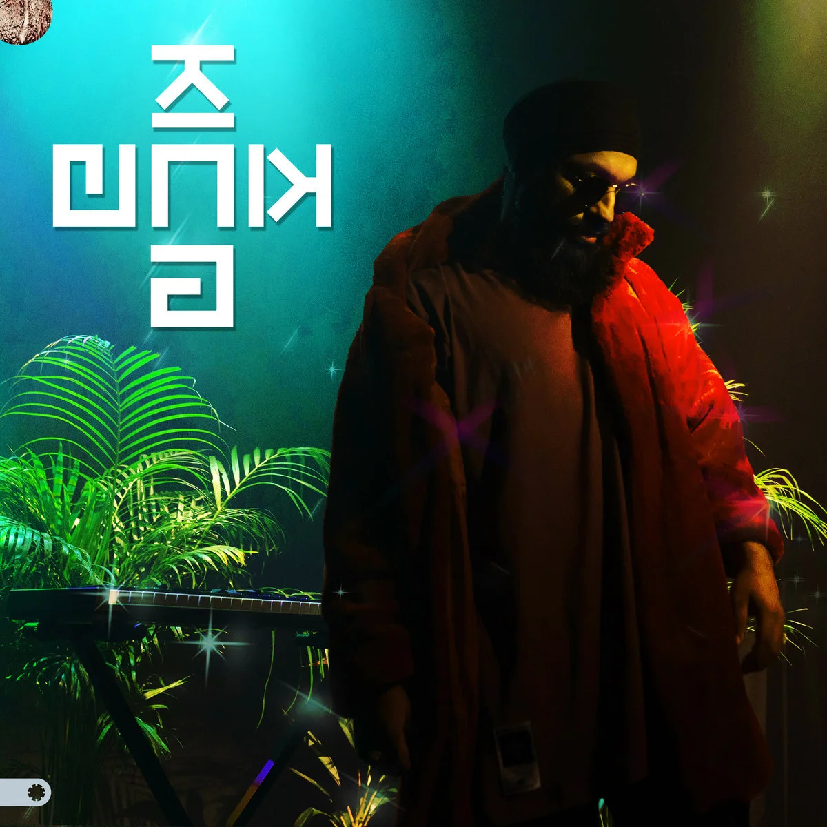 Person in vibrant red coat standing indoors with keyboard and plants in the background, under colorful lighting, with stylized text above.