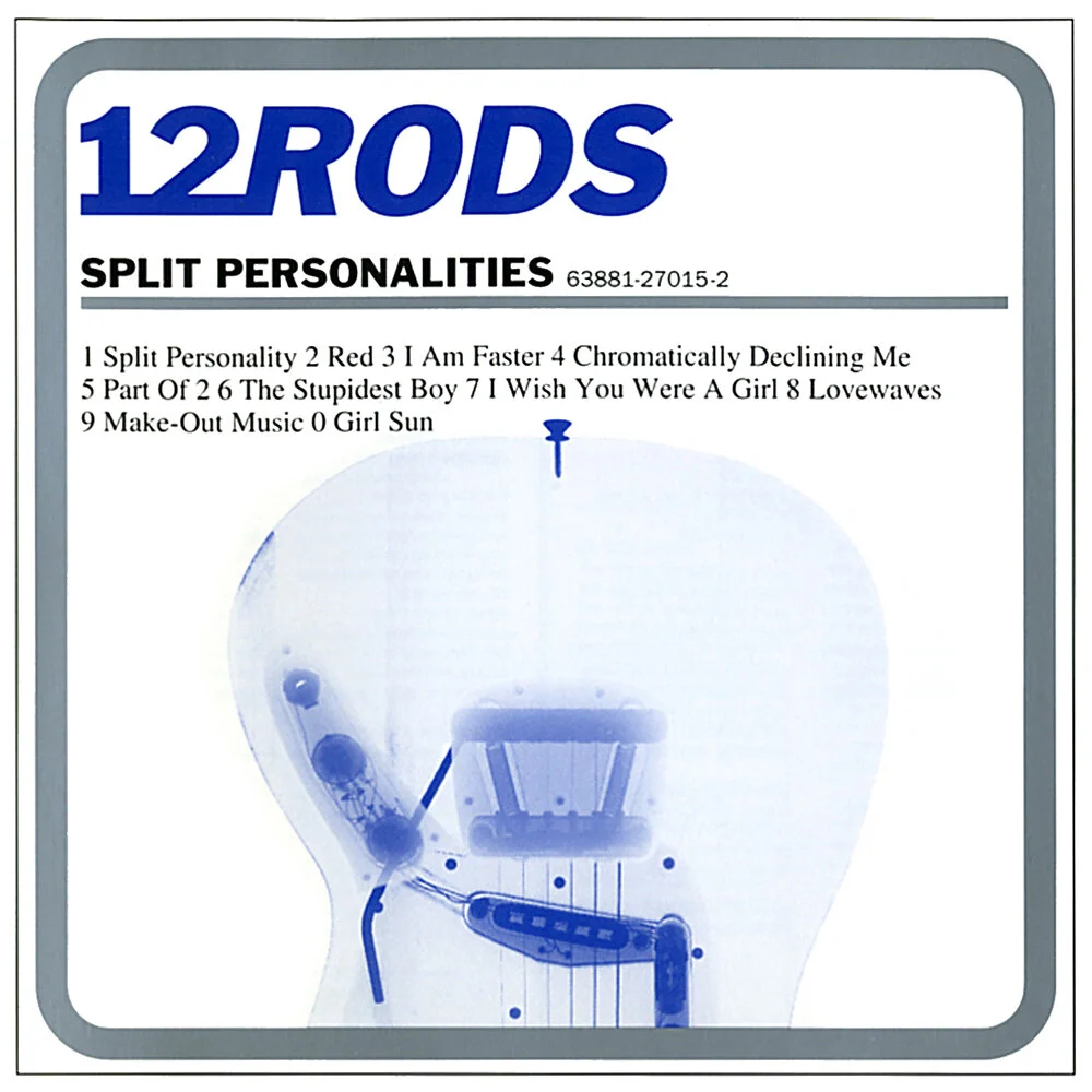 Album cover for "Split Personalities" by 12 Rods featuring x-ray image of a guitar and tracklist.
