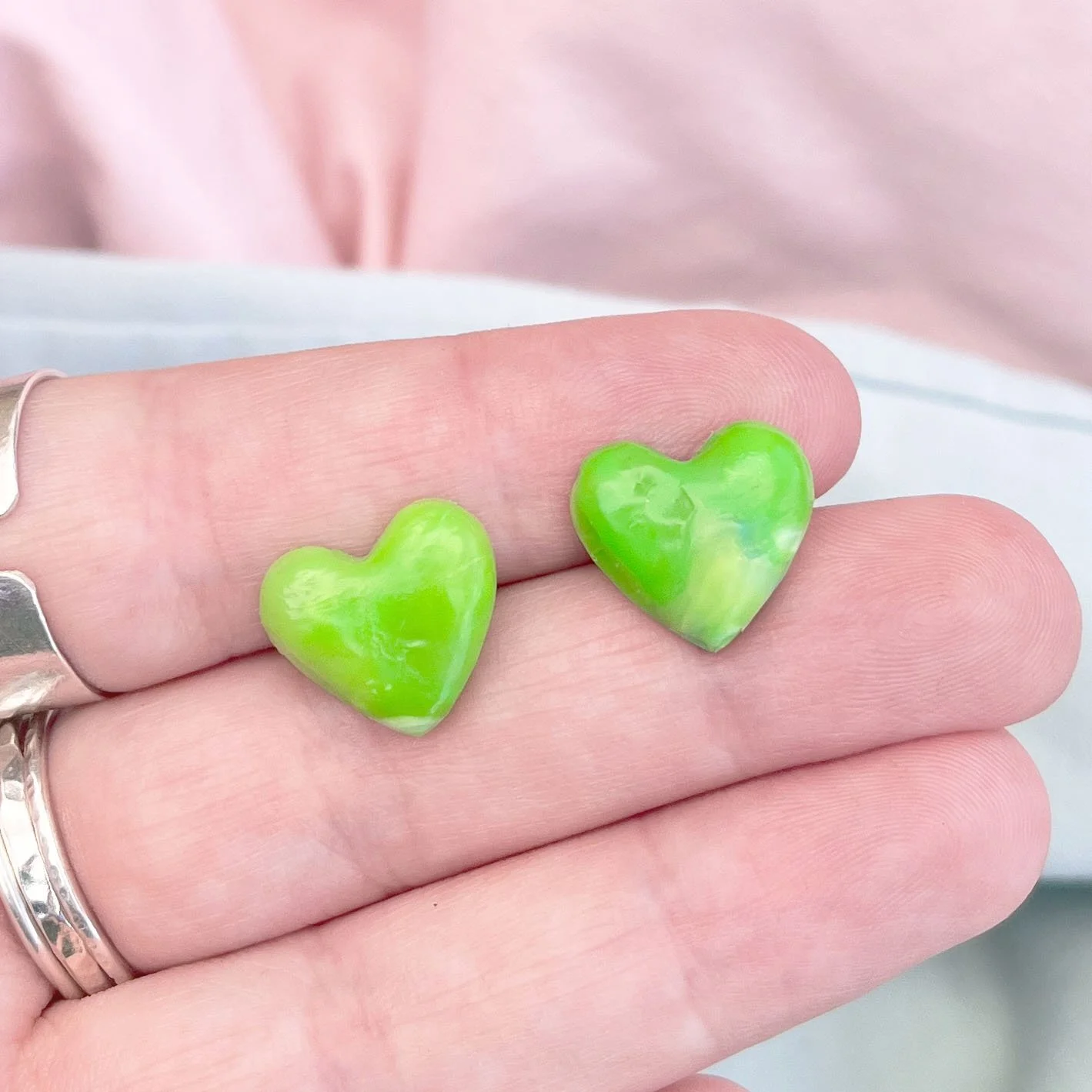 light green lovesick studs.jpg