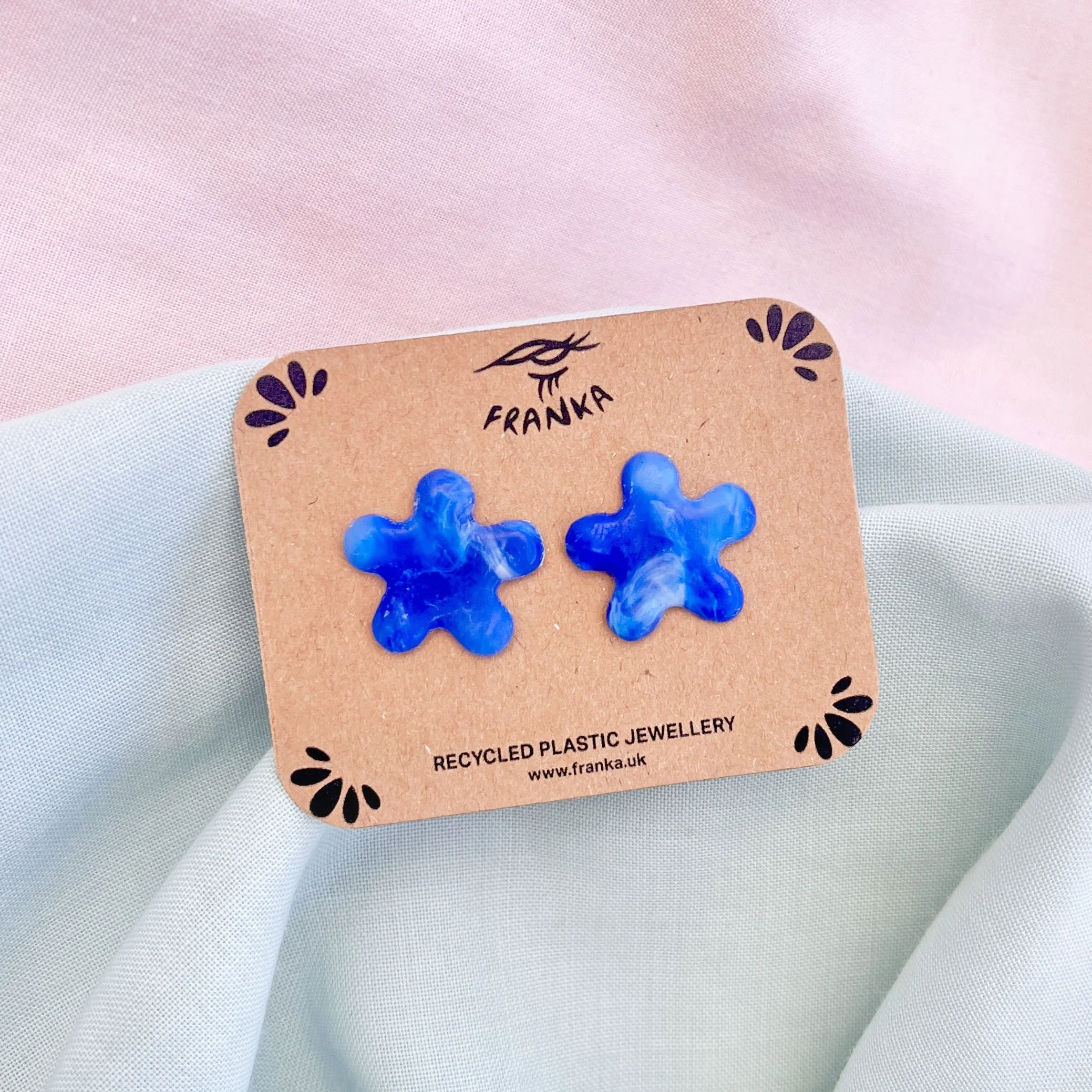 blue squiggle studs.jpg