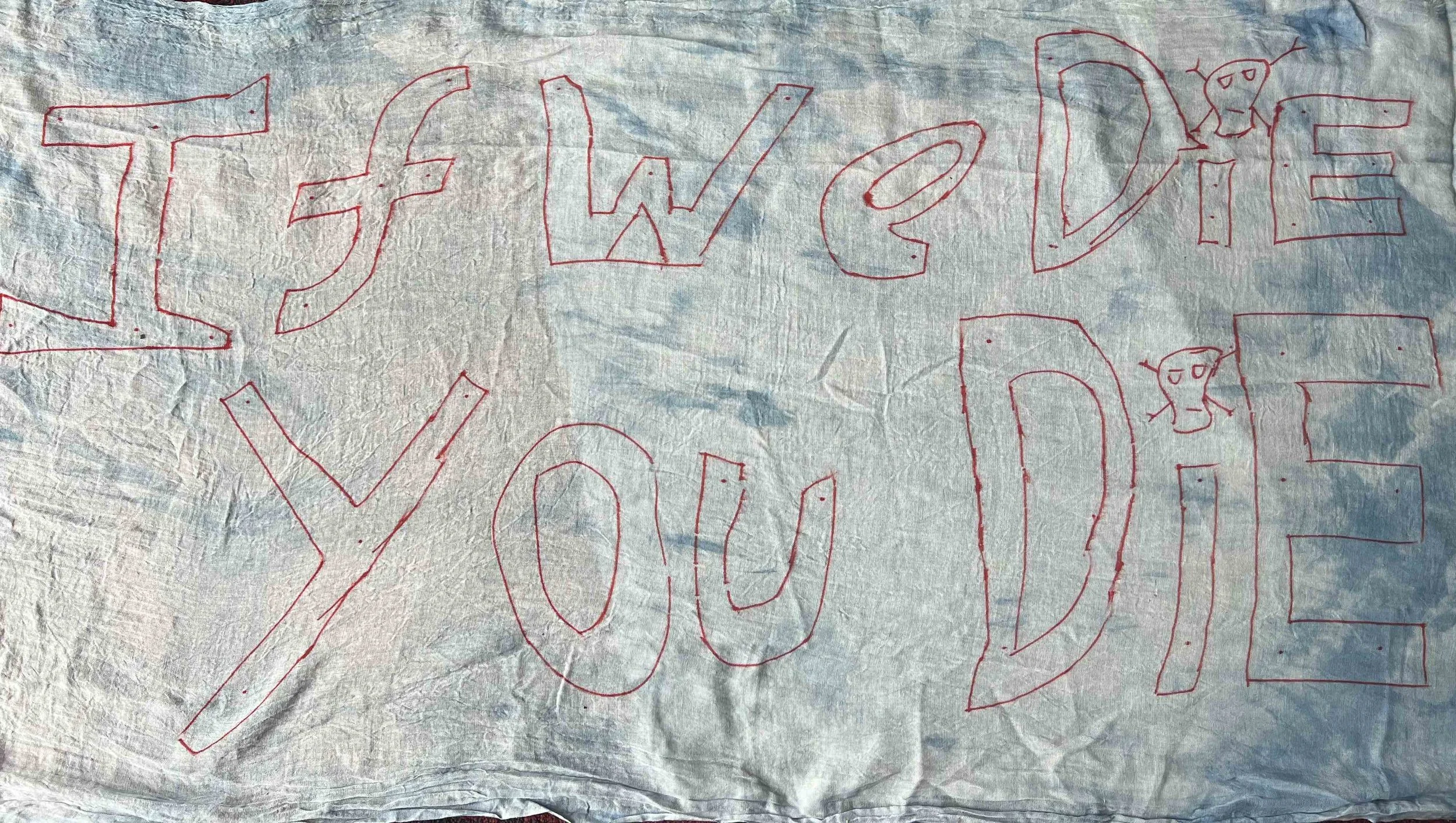 If We Die You Die banner designed by the young people on the project