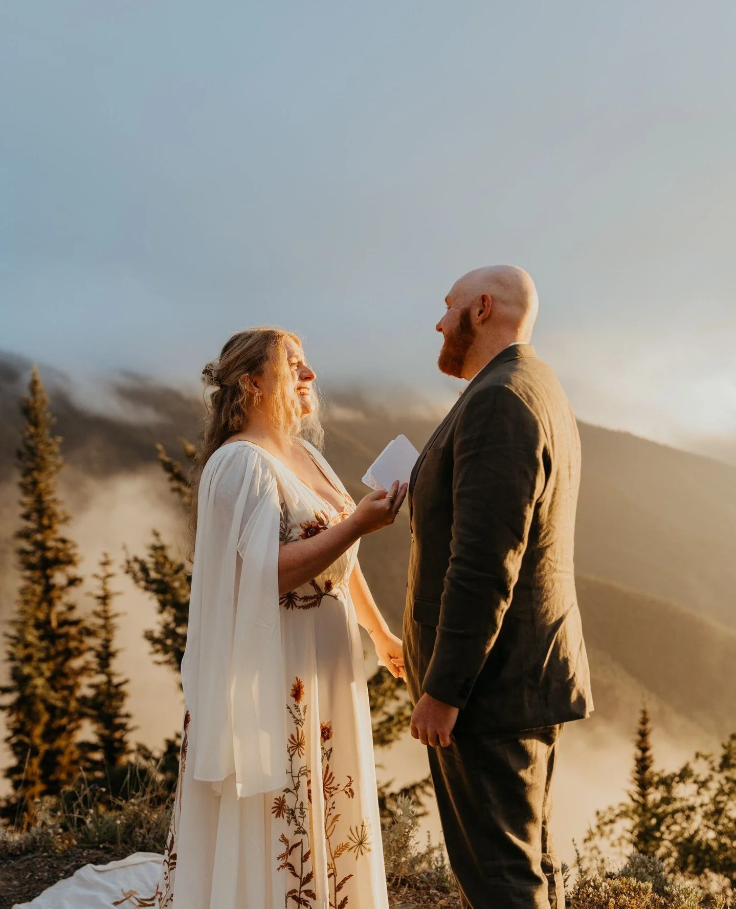 That one time we got married on the side of a rutted out forest road.⁠
⁠
These two got a little bit of everything for this moody June elopement day in Olympic National Park &mdash; some clouds, some sun, some fog, and one of the most insane sunsets I