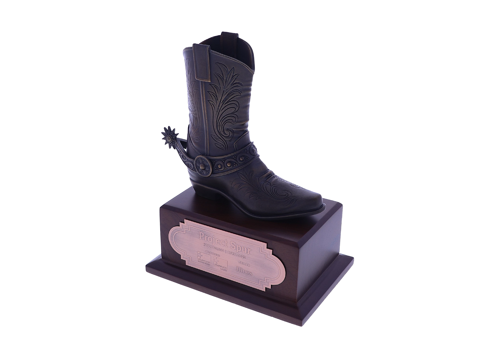 Cowboy boot atop a rectangular base