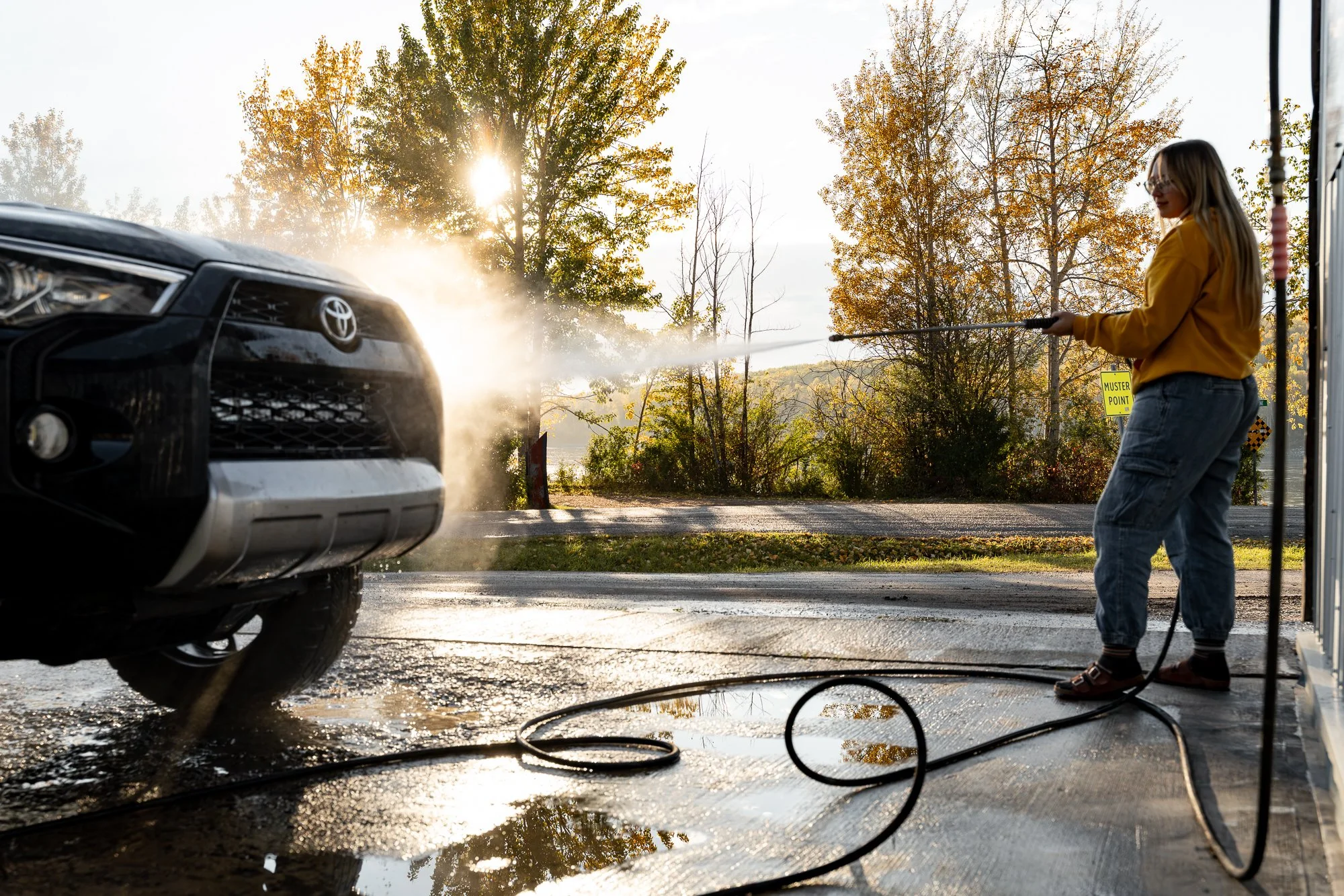 NWT-Fort-Liard-woman-washing-car-15.jpg