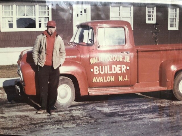 Bill Tozour in front of his first construction company truck in 1955.