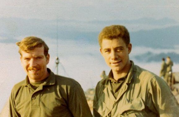 Bruce Land (left) with Army buddy Tom Walsh.