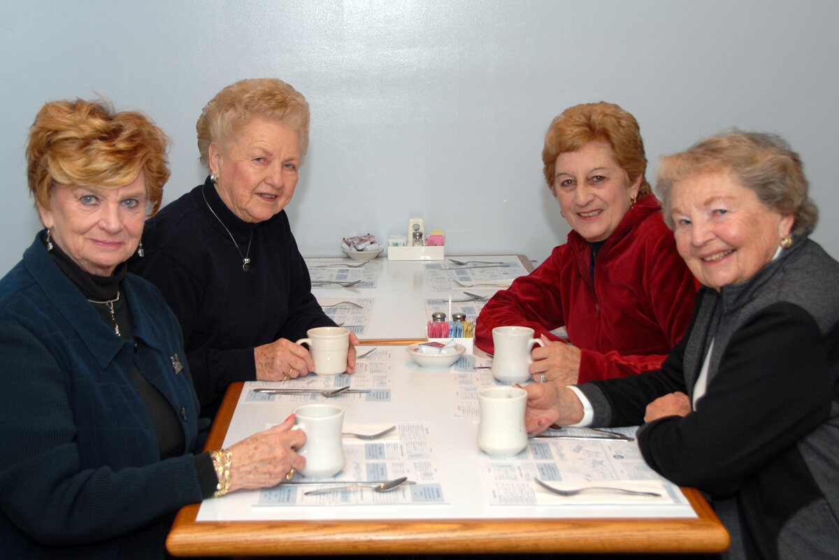 Joan Hunter, Elsie Kuhn, Lynn Covington and Mittie Pearson enjoying coffee  while celebrating APAC’s 25th anniversary in 2007.