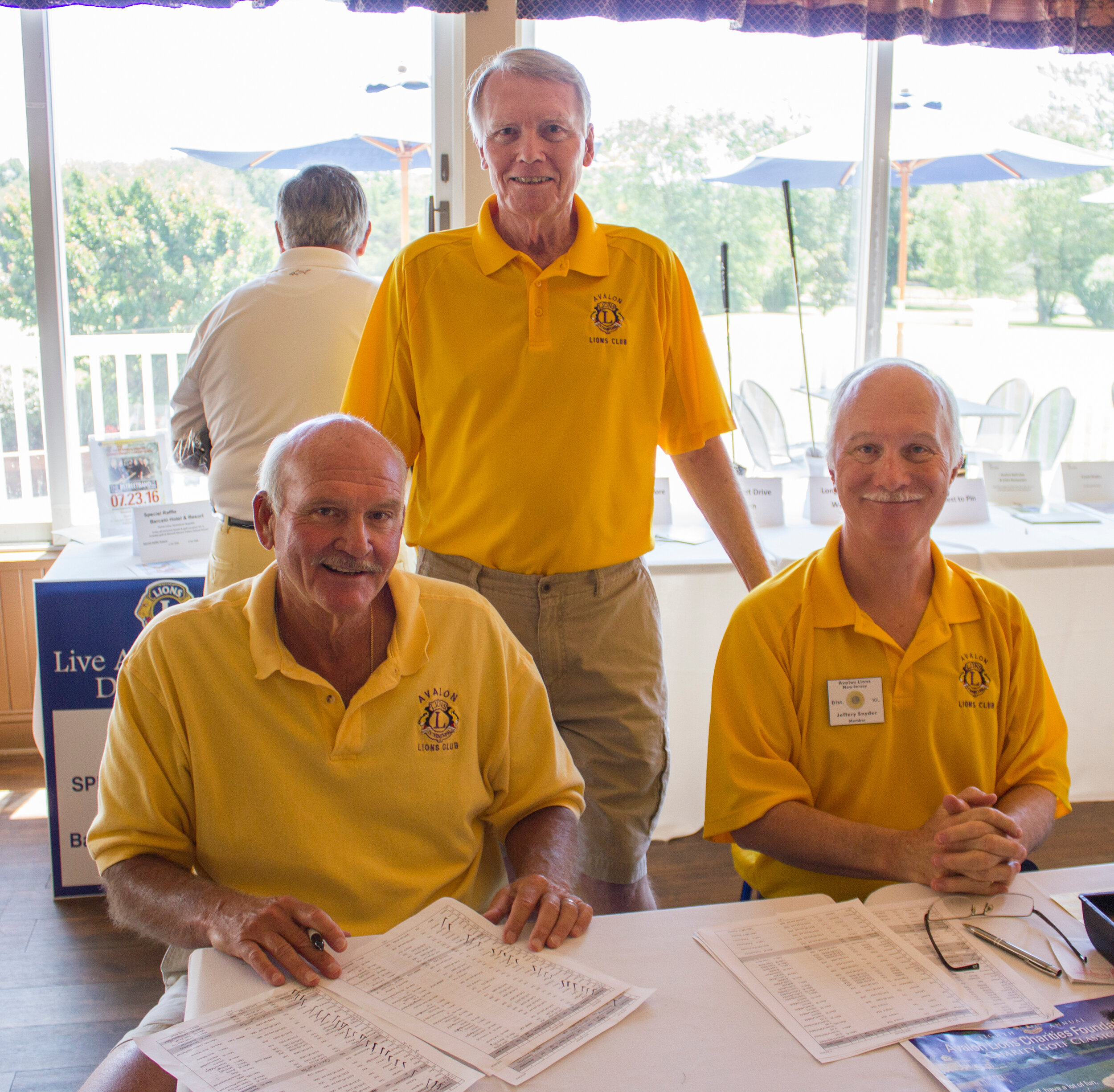 Alex Shaleway, Jeff Snyder, and Chuck Covington registering golfers  for the Lions Club annual charity golf classic.