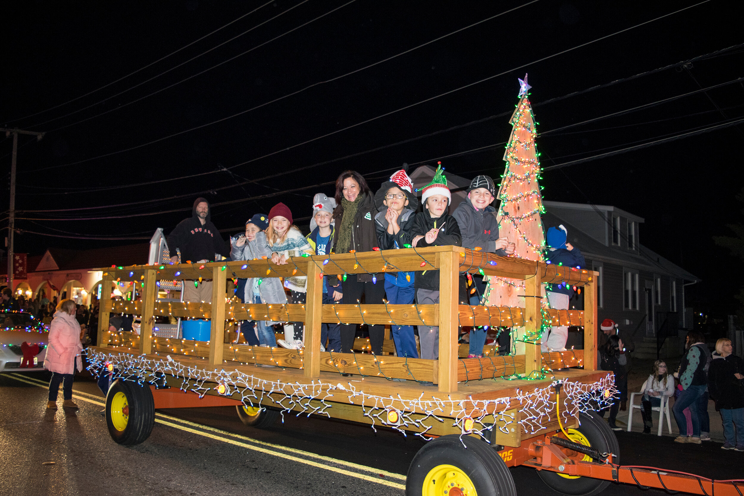 Students from Avalon and Stone Harbor Schools  ride the float during the annual Christmas Parade.