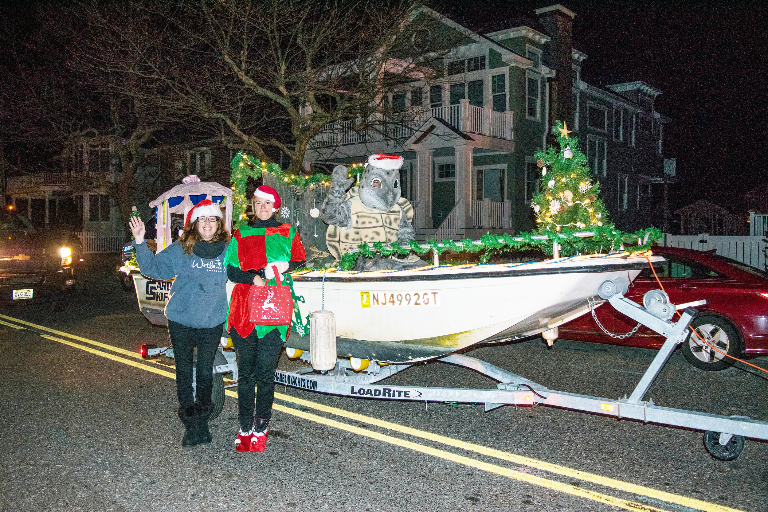 Members of The Wetlands Institute staff and its mascot ‘Scute  in the Stone Harbor Christmas parade.