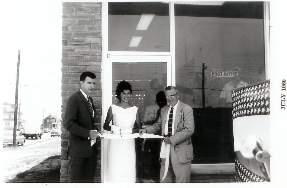 Mayor Donald Everingham, Miss Avalon, Nancy Warren, and Cape May County Postmaster, Elmer S. “Stan” Holmes Jr. at the Grand Opening Ceremony Ribbon Cutting of the post office, July 16, 1960.