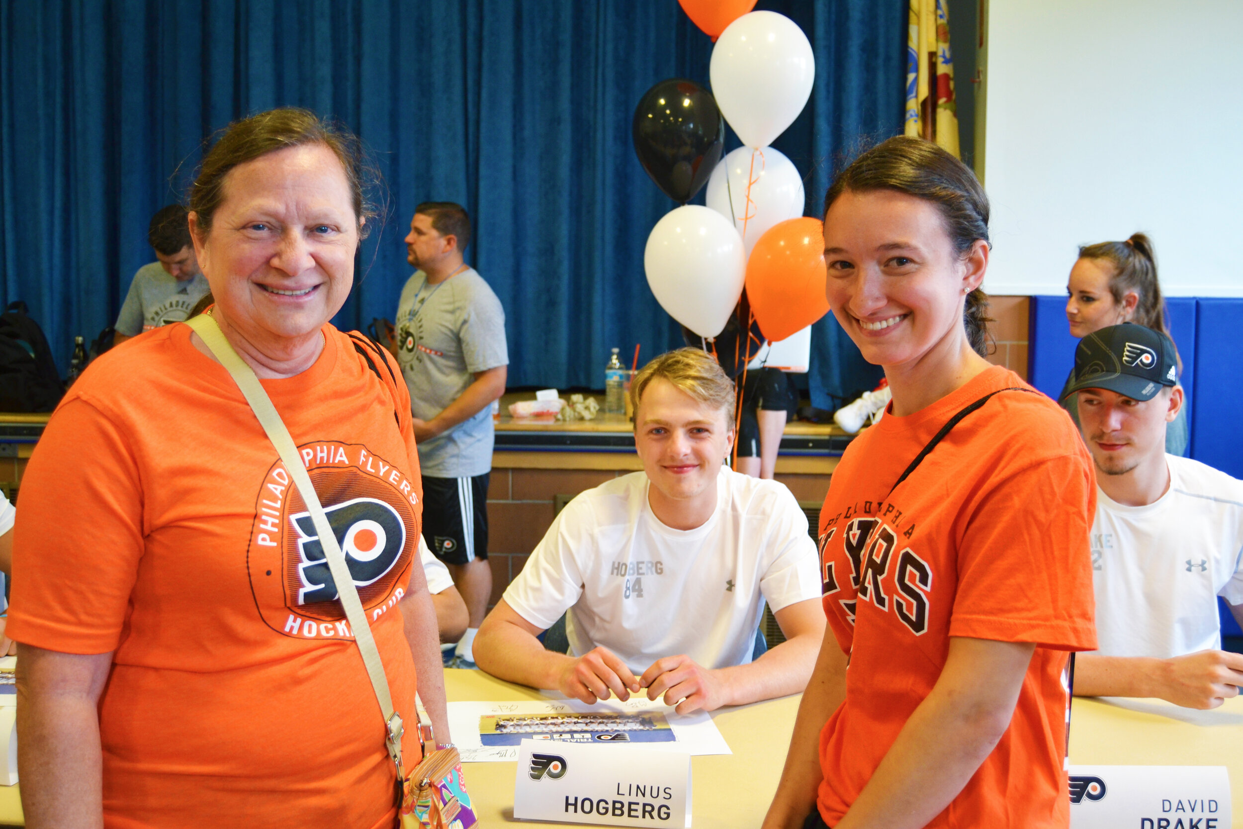 Sara and Merle Silverman getting an autograph from prospect Linus Hogberg. 