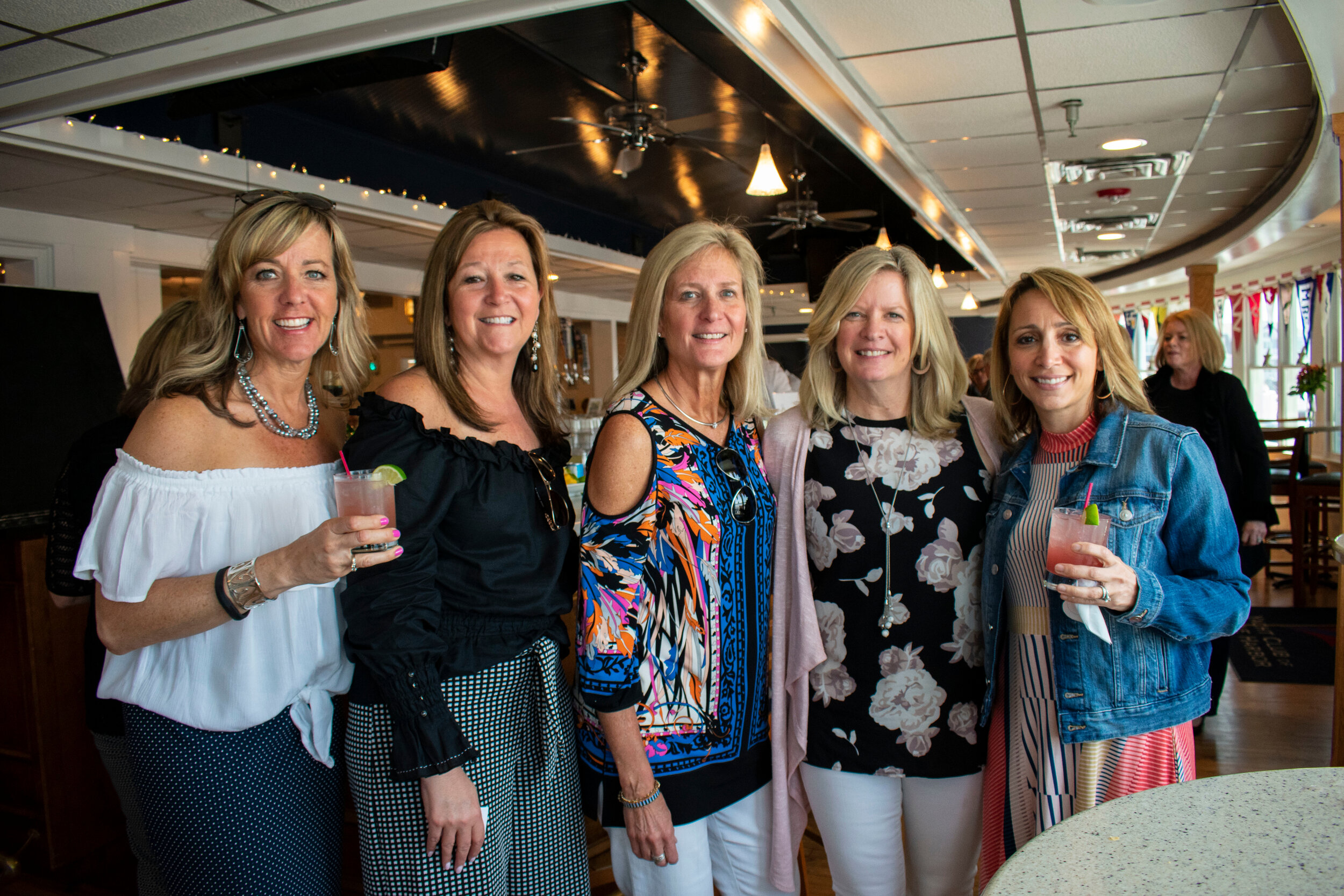 Deb Castare, Jill Nestor, Jan Gianforte, Tracey Littleton and Natalie Lawton enjoy fashion and fun at the 2018 Play With Jack Fashion Show.