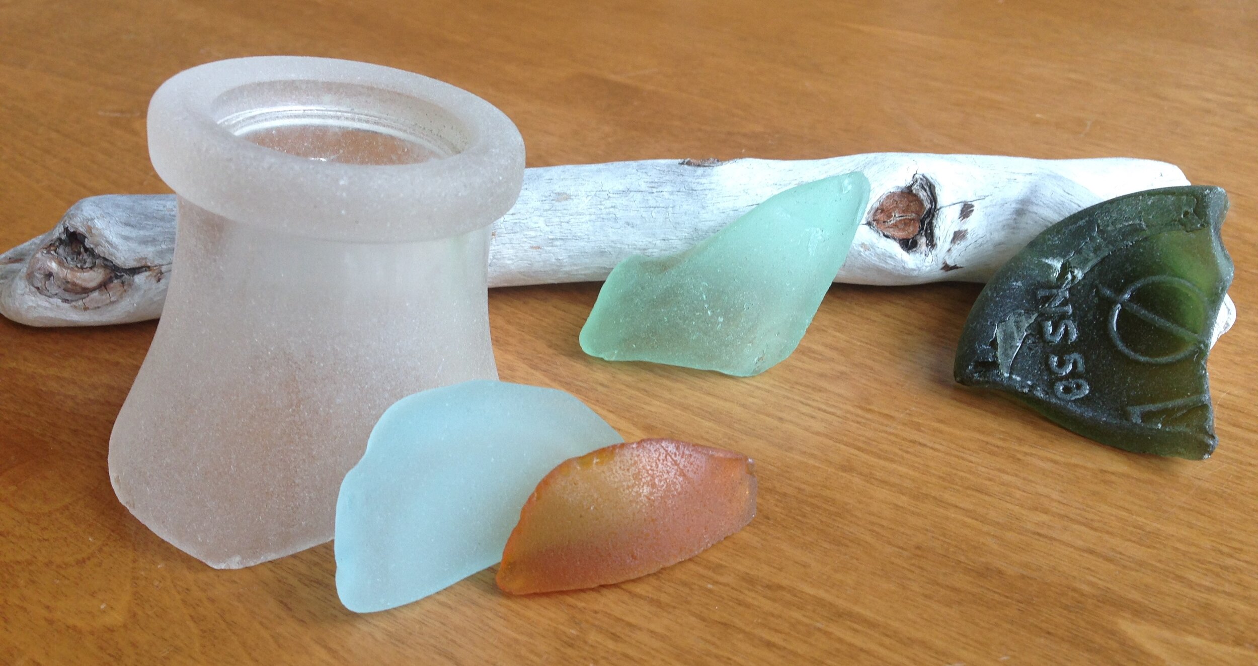 Various pieces of sea glass found on local beaches.
