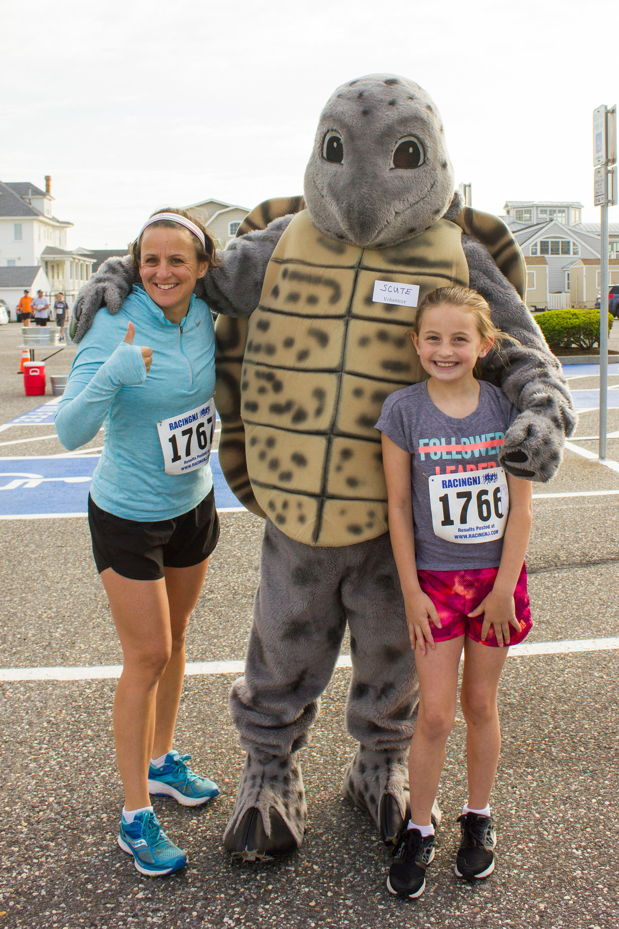 Lorrie and Emily Logan with The Wetlands Institute’s mascot, ‘Scute the Tute Terrapin at the Turtle Trot race.