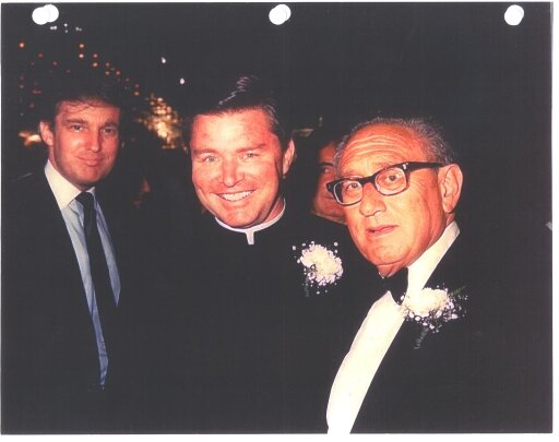 Father Riley meeting future president Donald Trump and Henry Kissinger (right).