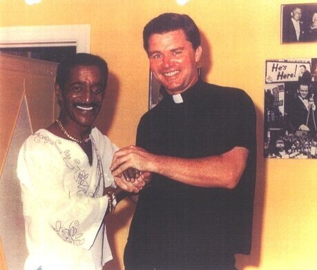 Father Riley with Sammy Davis Jr.