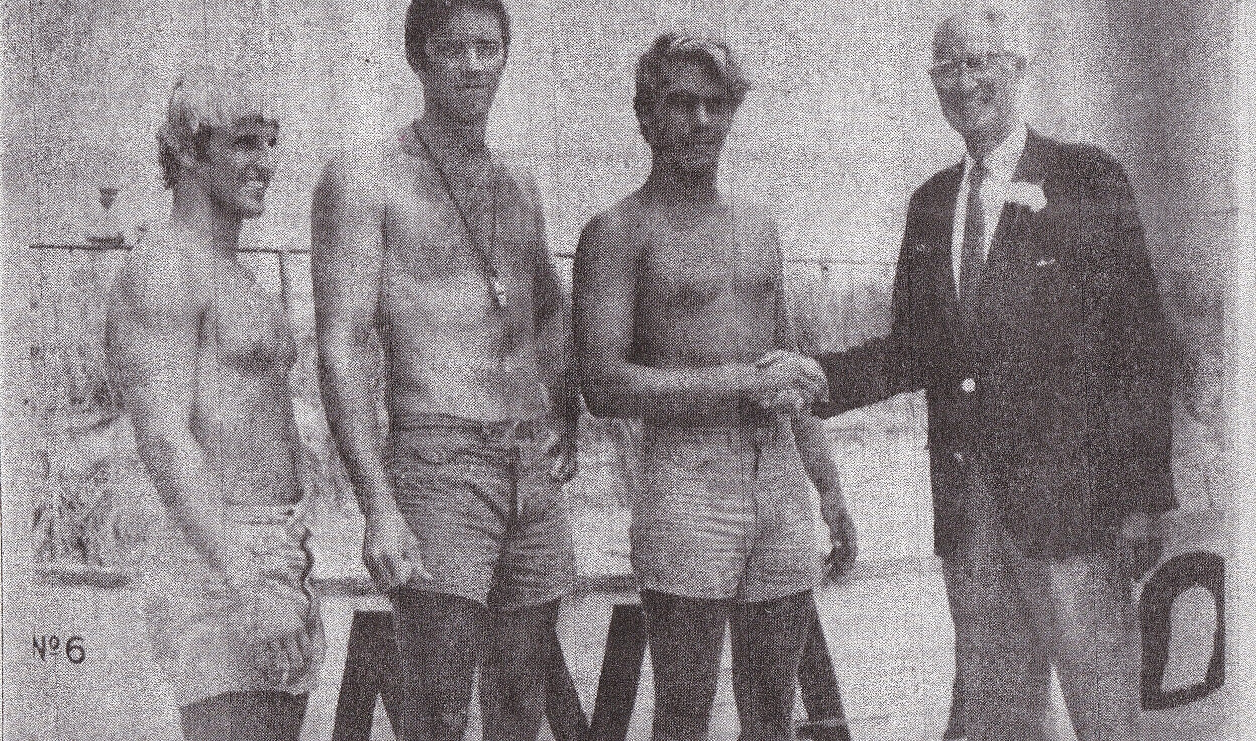  Mike Smith (left), Jim O’Brien and Dick Gleason are congratulated by Avalon Mayor Edgar V. Bell for their first place finishes. Smith and O’Brien placed first in the doubles boat race and Gleason won the long swim. 