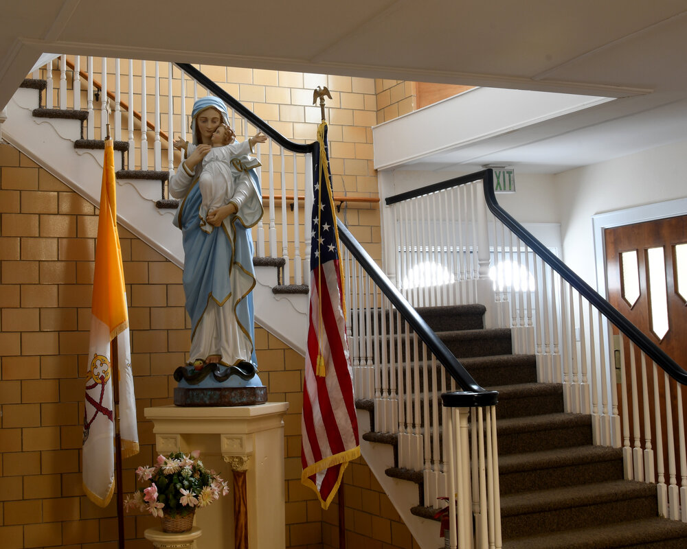The main staircase inside the entrance to Villa Maria, which now also has an elevator, circa 2019.