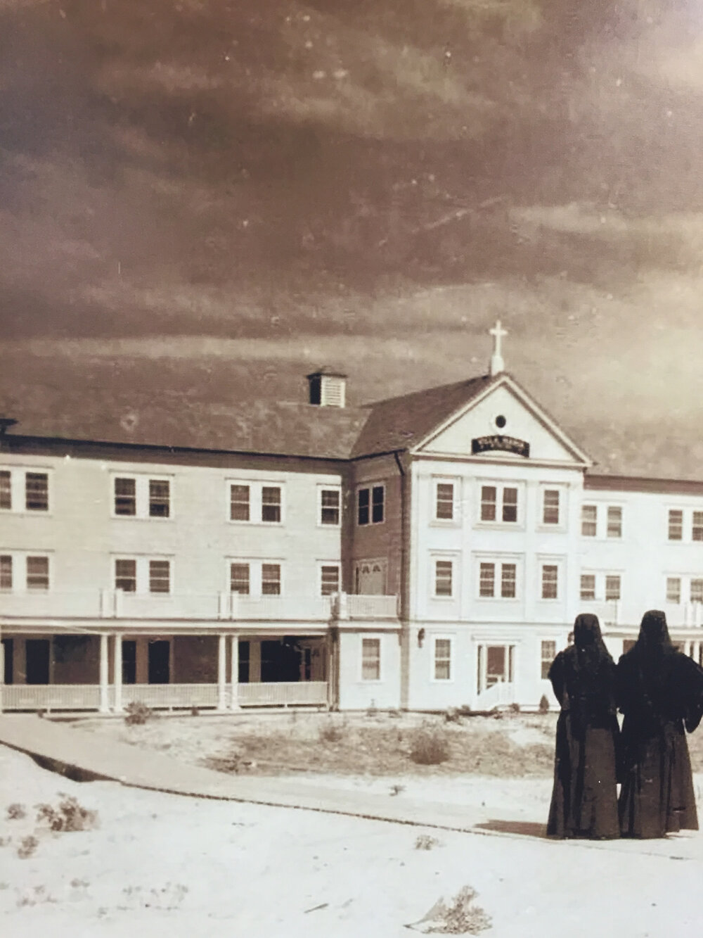 Two IHM nuns take a look at the recently completed Villa, circa 1937.