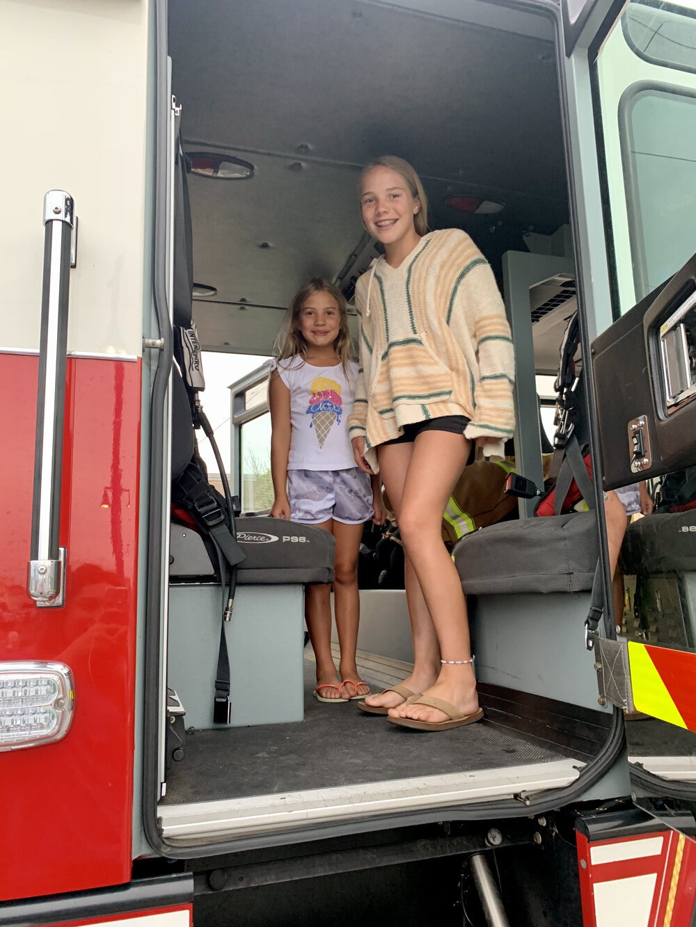 Mackenzie and Reese Cush explore one of Avalon  Fire Department’s engines at National Night Out.