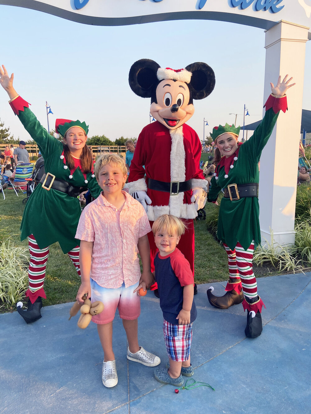 Anderson and Ellis Keefer with elves at Christmas in July.