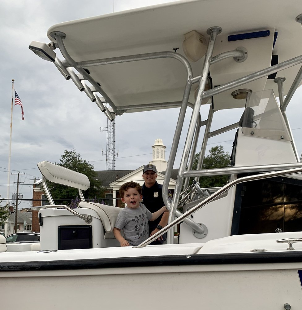 Ralph Serpico explores Stone Harbor Police  Department’s boat at National Night Out.