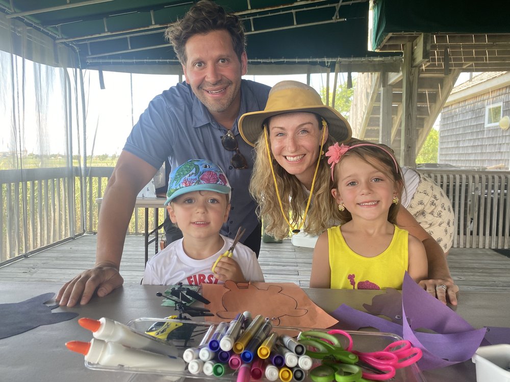 Nino, Mila, Will, and Erin San Doval making turtle  crafts at the Wetlands Institute’s Crabulous Crab Day.