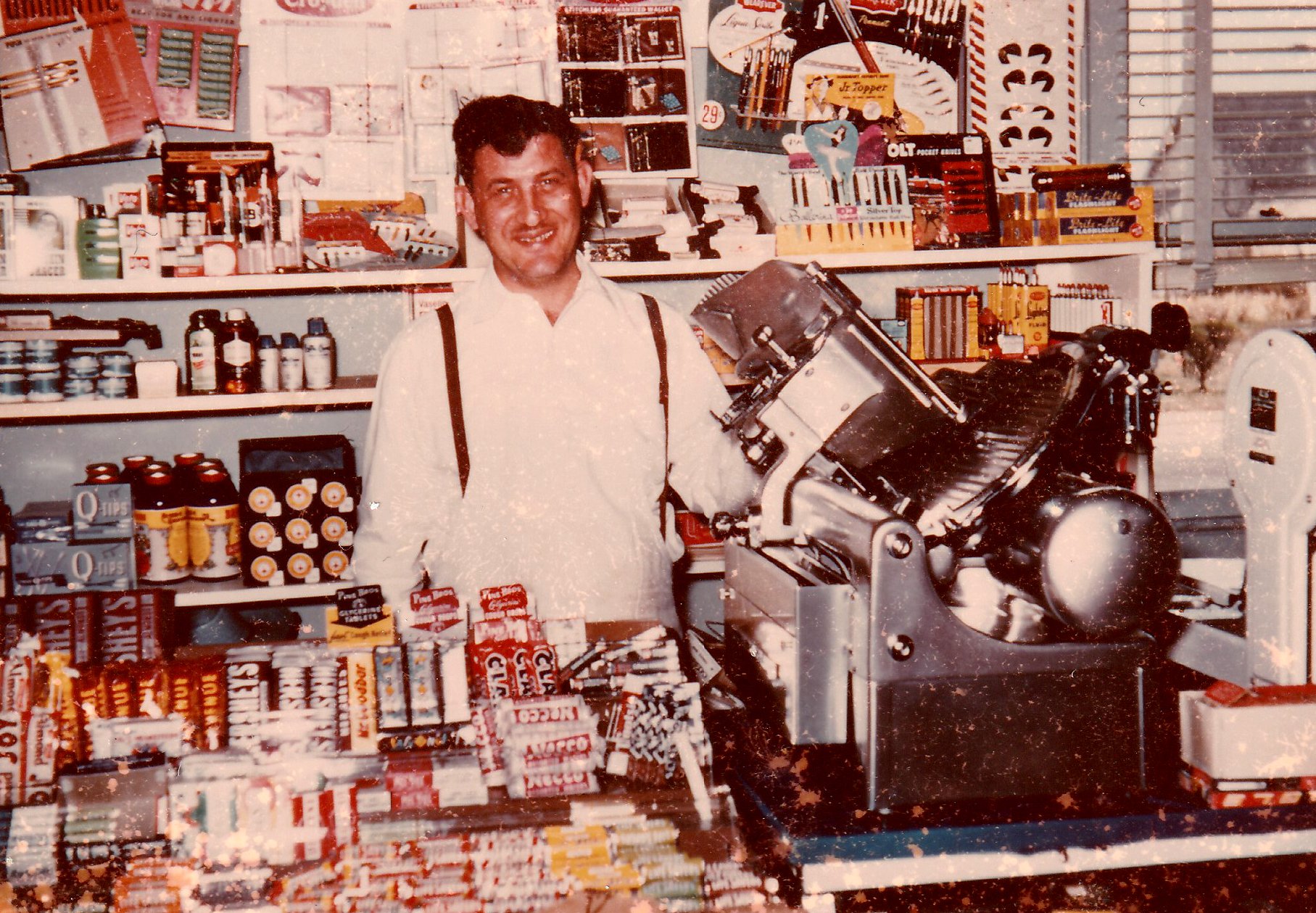 Sam’s was a legendary stop for candy by locals. Here’s Sam behind his candy counter in 1956.