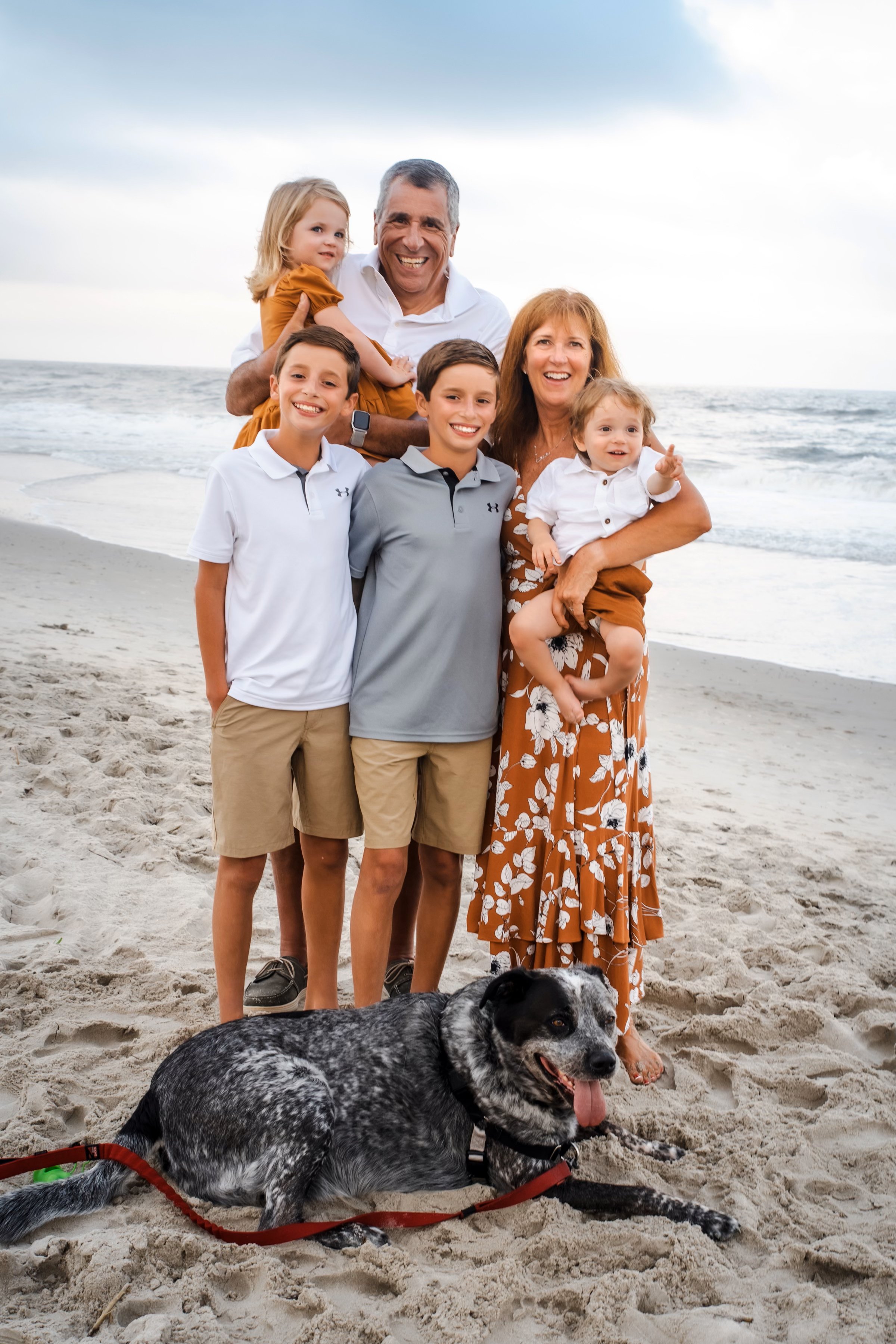 Angelo and Gail Cataldi with their grandchildren Dylan, Chase, Delaney and Dash on the beach in Sea Isle City. And that’s Bently lying in the sand.