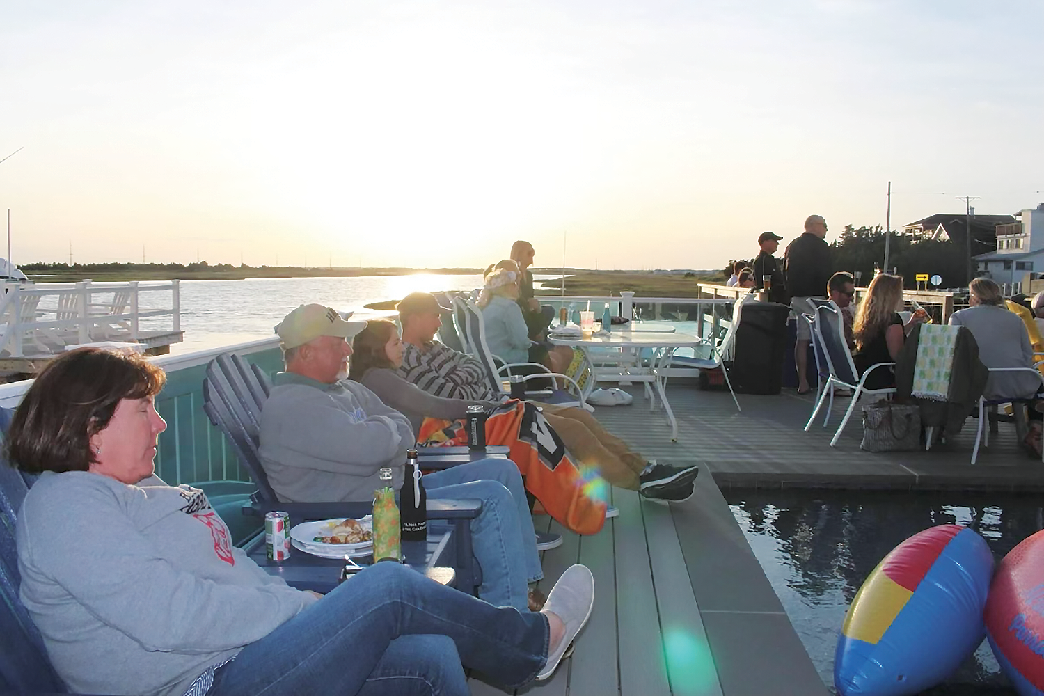 Enjoying Peter Mayer’s music as the sun sets over the bay.