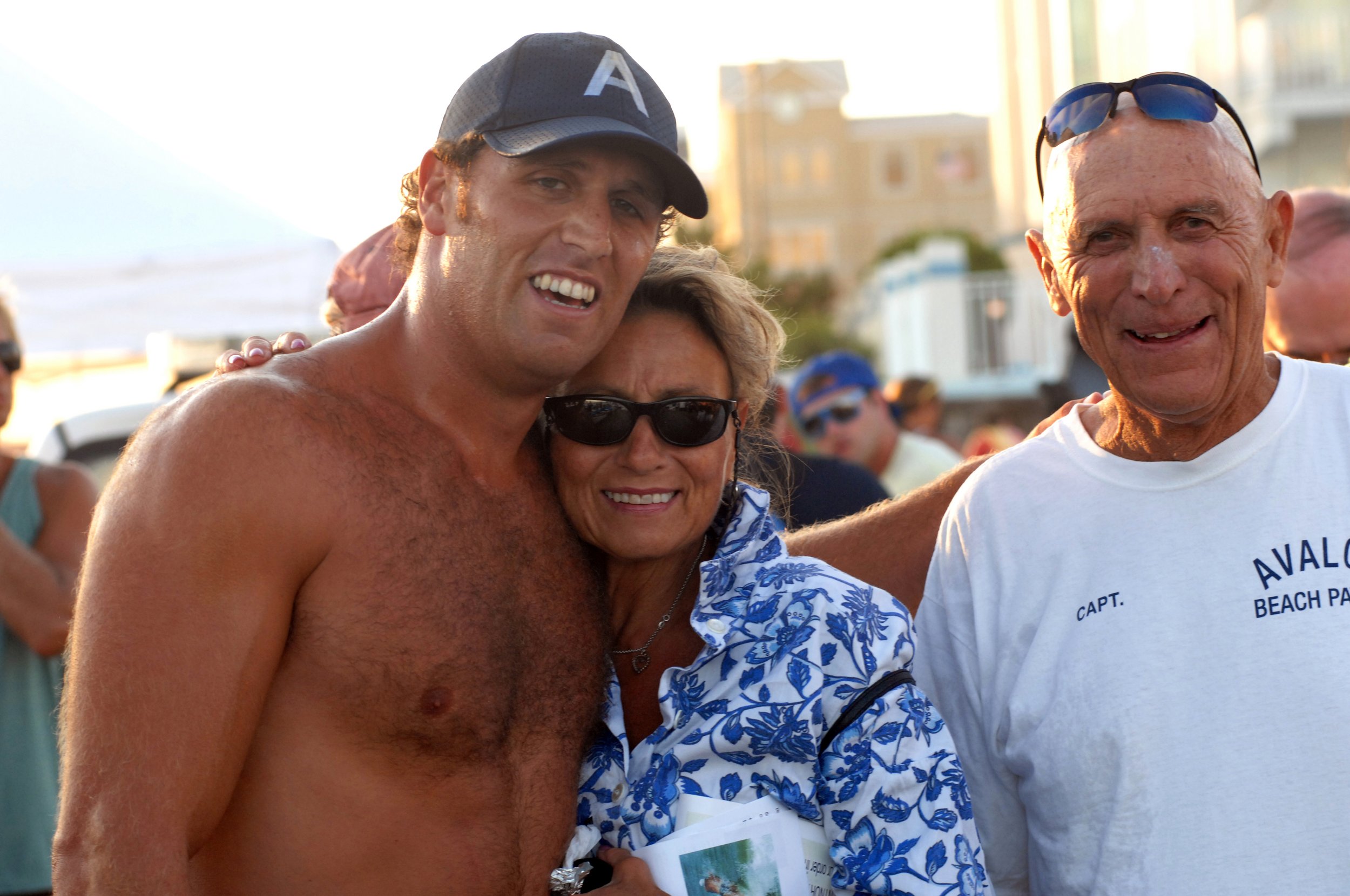 Erich Wolf celebrates his first South Jersey singles  championship in 2011 with his parents.