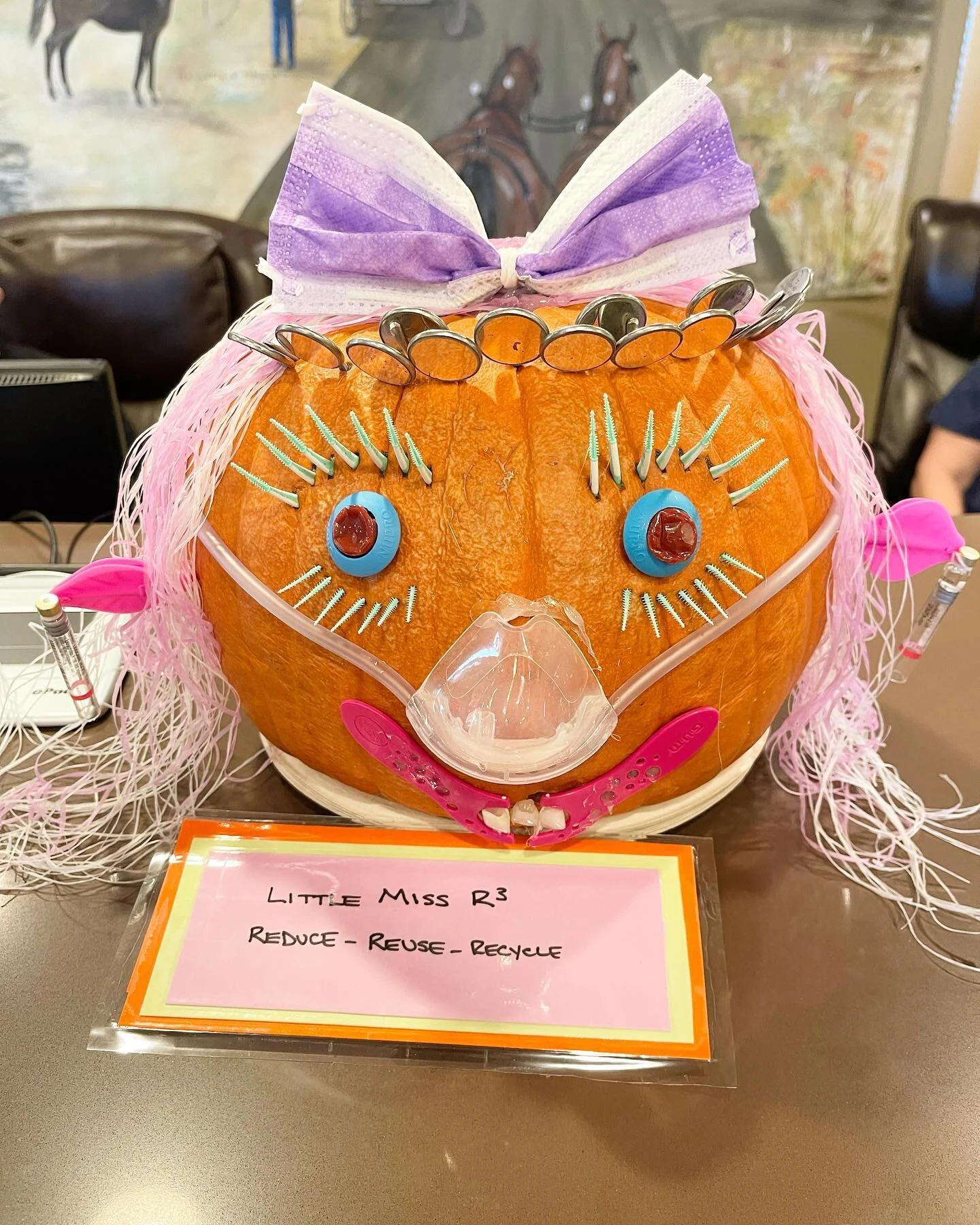 Reduce, Recycle, Reuse. Our talented Hygienst @ellen_rdh decorated this pumpkin with used dental materials! @wilsonkimorthodontics.  #dental #dentist #teeth #halloween #tooth #smile